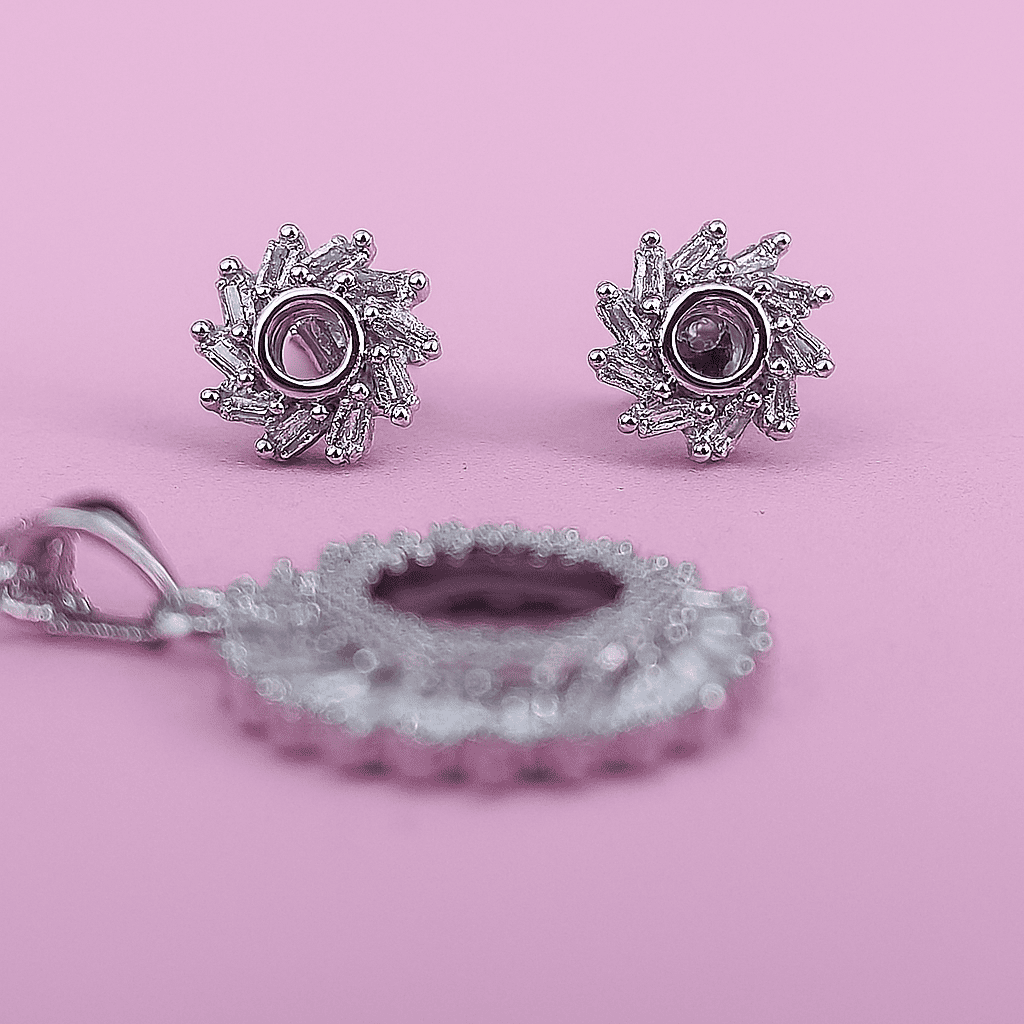 Luxury zircon circular earrings with matching pendant blurred in foreground on pink background